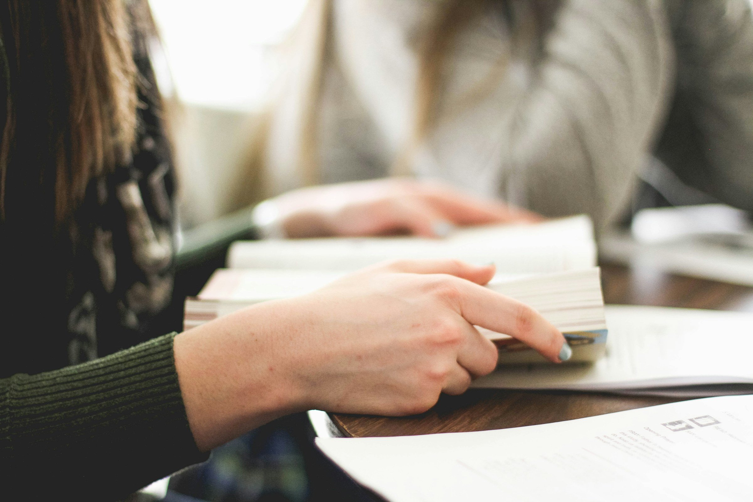 woman studying - firefigher aptitude test