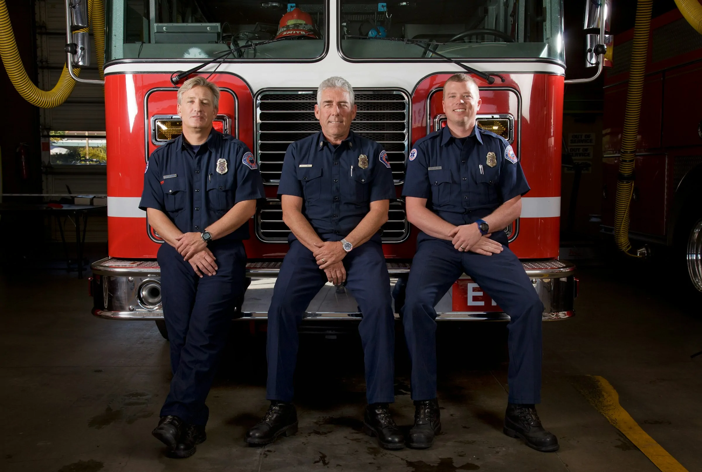 Fire Fighters standing near Fire Truck - FRV Values